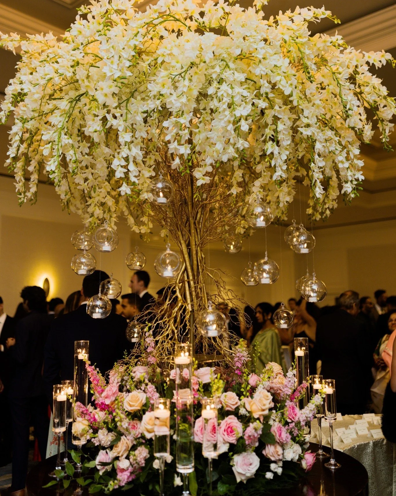 A spring garden, brought to life indoors. 🌸

Soft blush, romantic rose, and layers of deeper pink transformed this ballroom into a lush, garden-inspired escape&mdash;filled with movement, texture, and an abundance of blooms.

Tall, airy centerpieces
