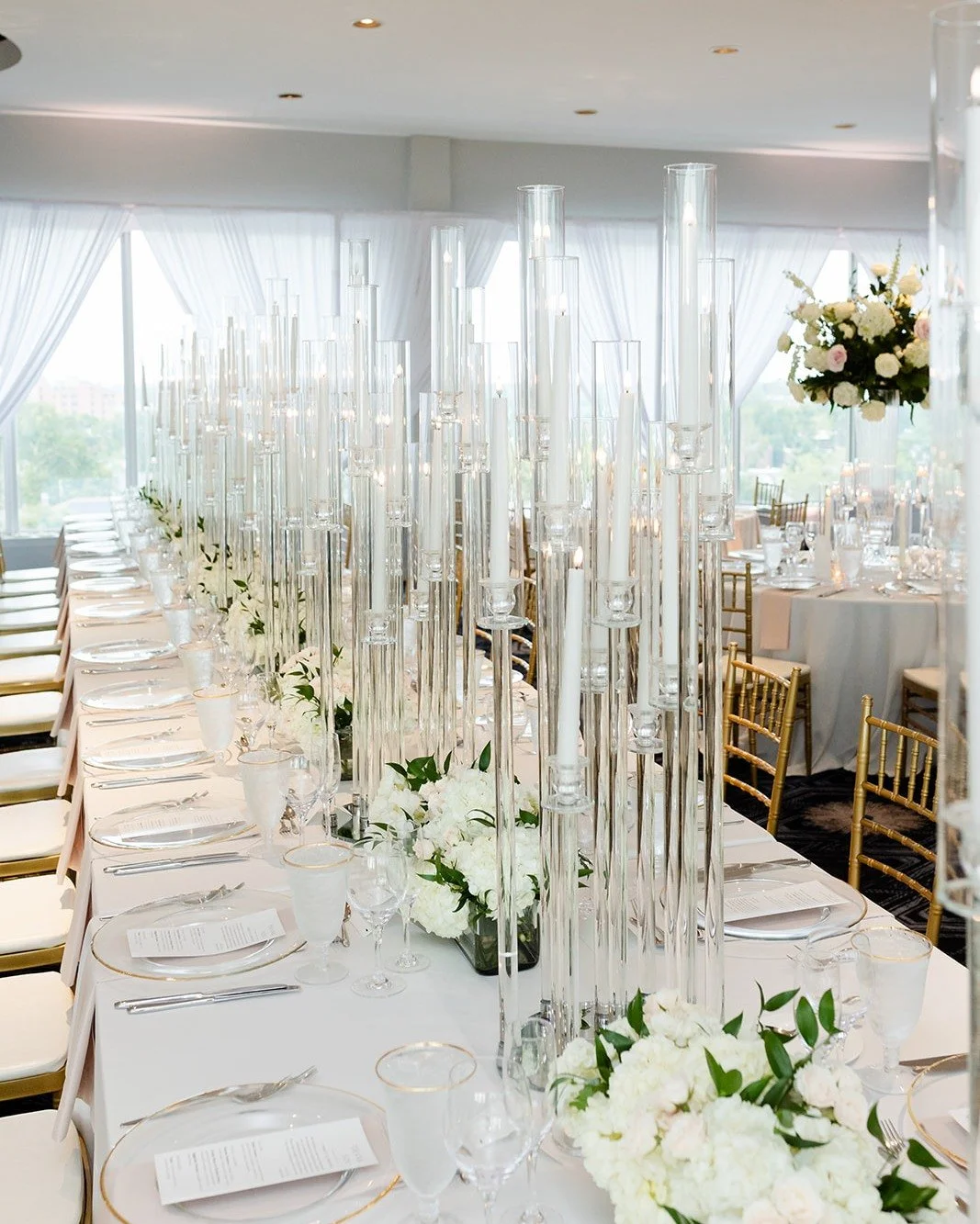 An all-white tablescape is anything but simple. 🤍✨

When working within a monochromatic palette, it&rsquo;s the layers, textures, and thoughtful details that bring a design to life. Lush white florals set the stage, but crystal candelabras, sparklin