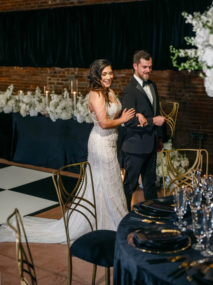 Bride and groom seeing their wedding reception room for the first time at the Gatsby Events Venue in St. Louis.