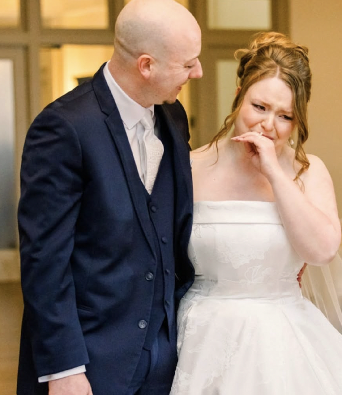 Bride and groom seeing their St. Louis wedding reception with flowers designed by Belli Fiori.