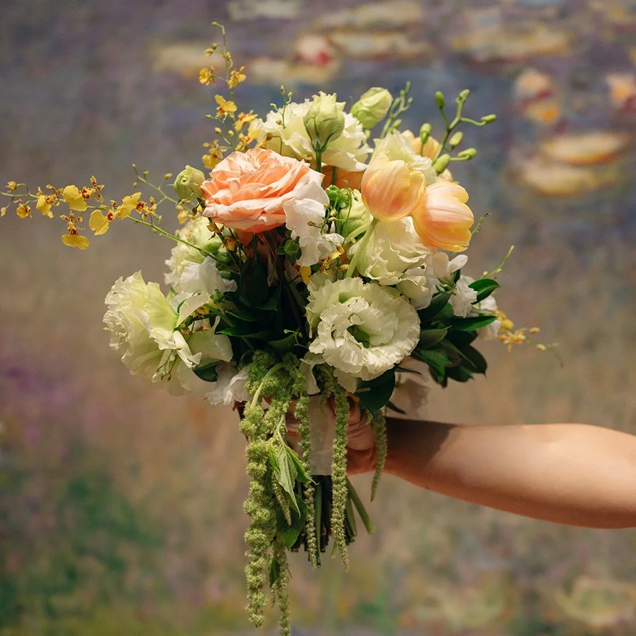 Bridal bouquet by Belli Fiori in front of the Monet painting at St. Louis Art Museum.