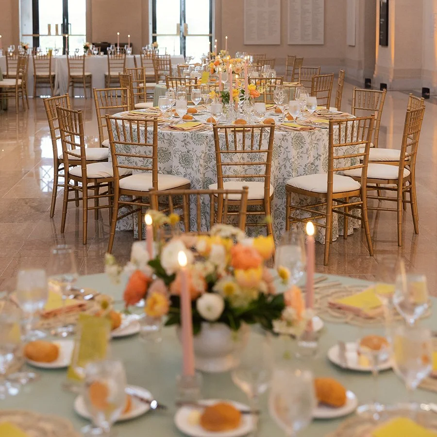 Reception tables at the St. Louis Art Museum with centerpieces designed by Belli Fiori.