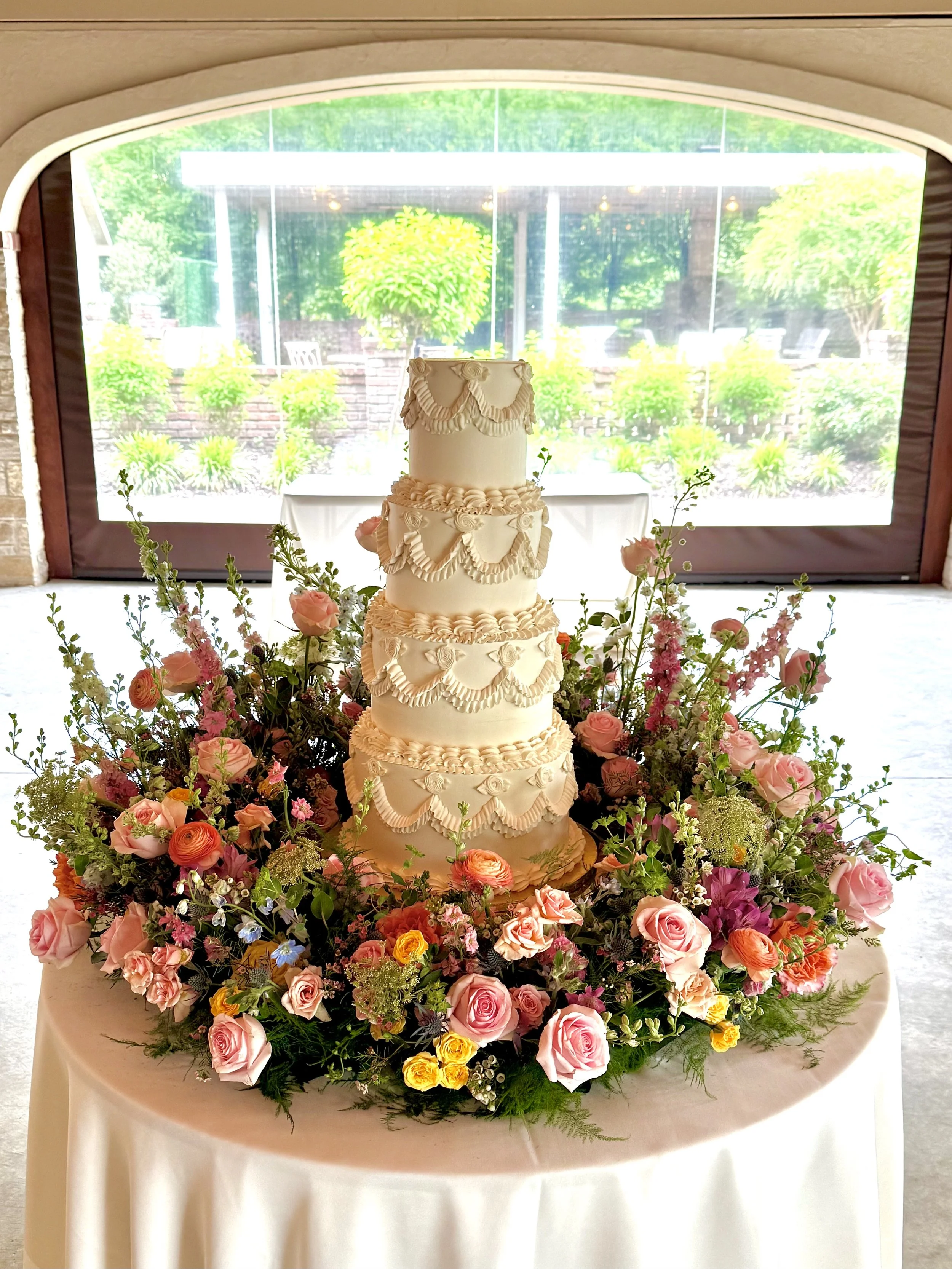 Four Tier Cake by Celebrating Life Cakes with a colorful Cake Meadow by your favorite Belli Fiori Team
