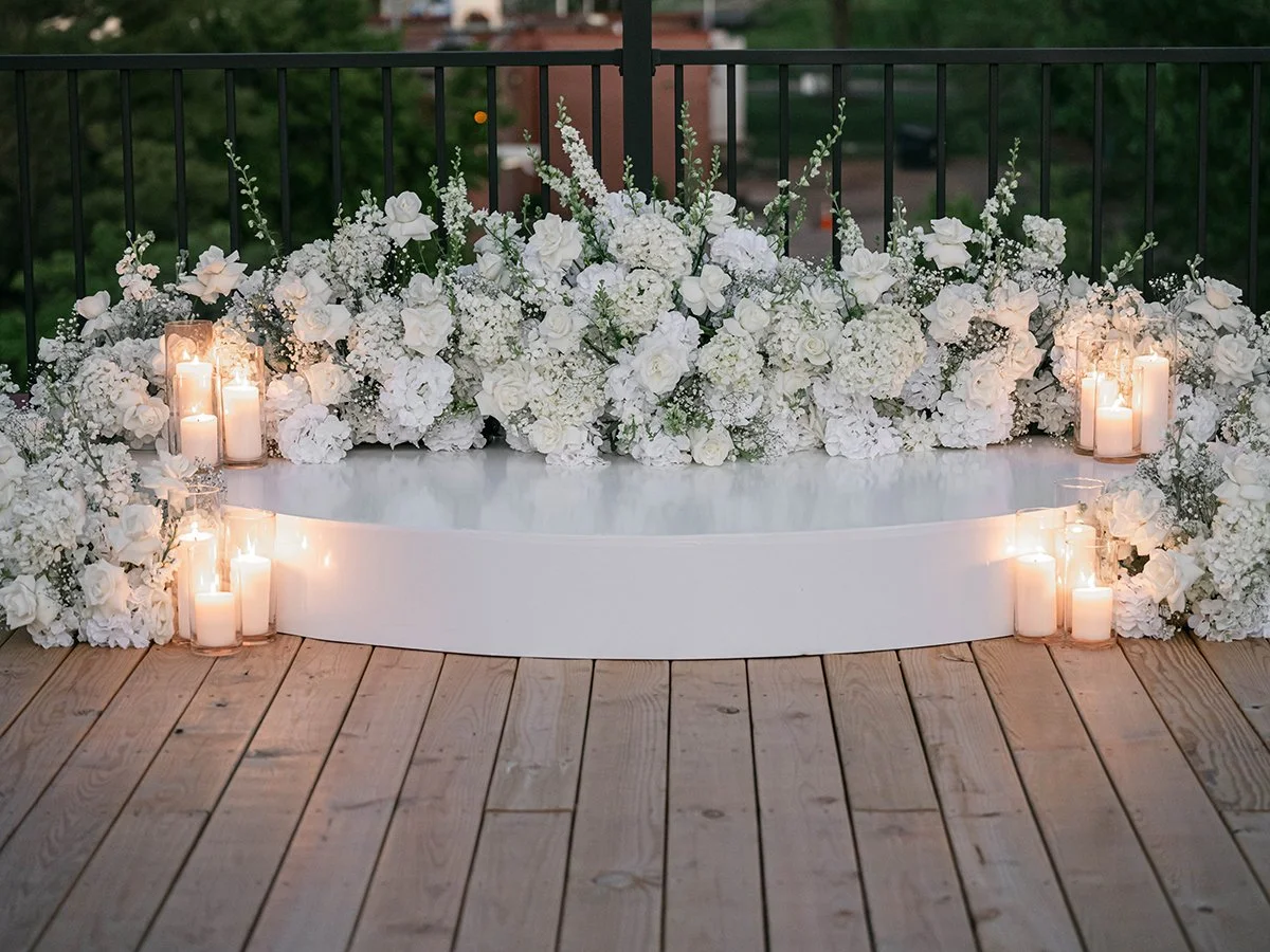 White wedding ceremony flower meadow on the rooftop of the Gatsby Events in St. Louis.