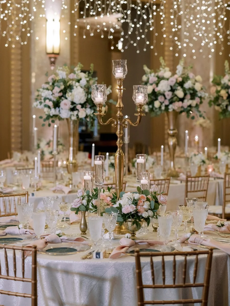 Blush and white rose centerpieces at the Stifel Theater in St. Louis.
