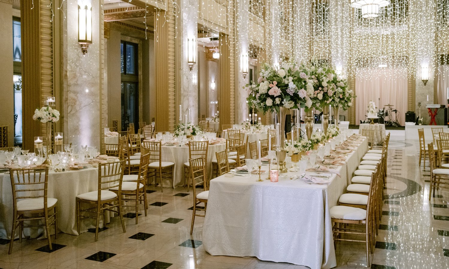 Blush and white rose centerpieces at the Stifel Theater in St. Louis.