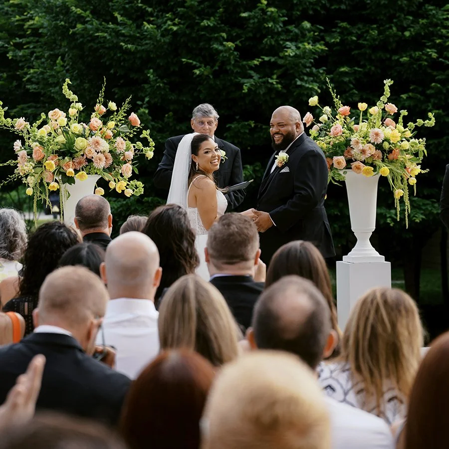 Outdoor wedding ceremony at the St. Louis Art Museum designed by Belli Fiori.