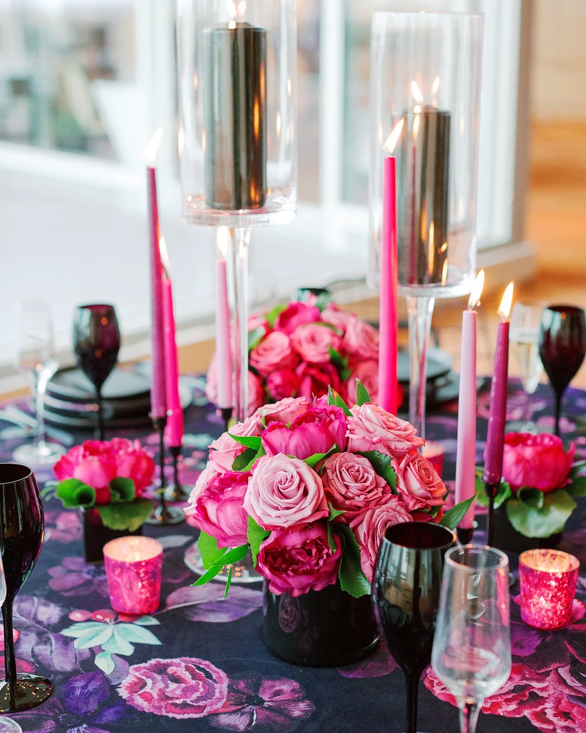 Vibrant fuchsia and purple modern wedding tablescape at Chase Park Hotel in St. Louis designed by Belli Fiori.