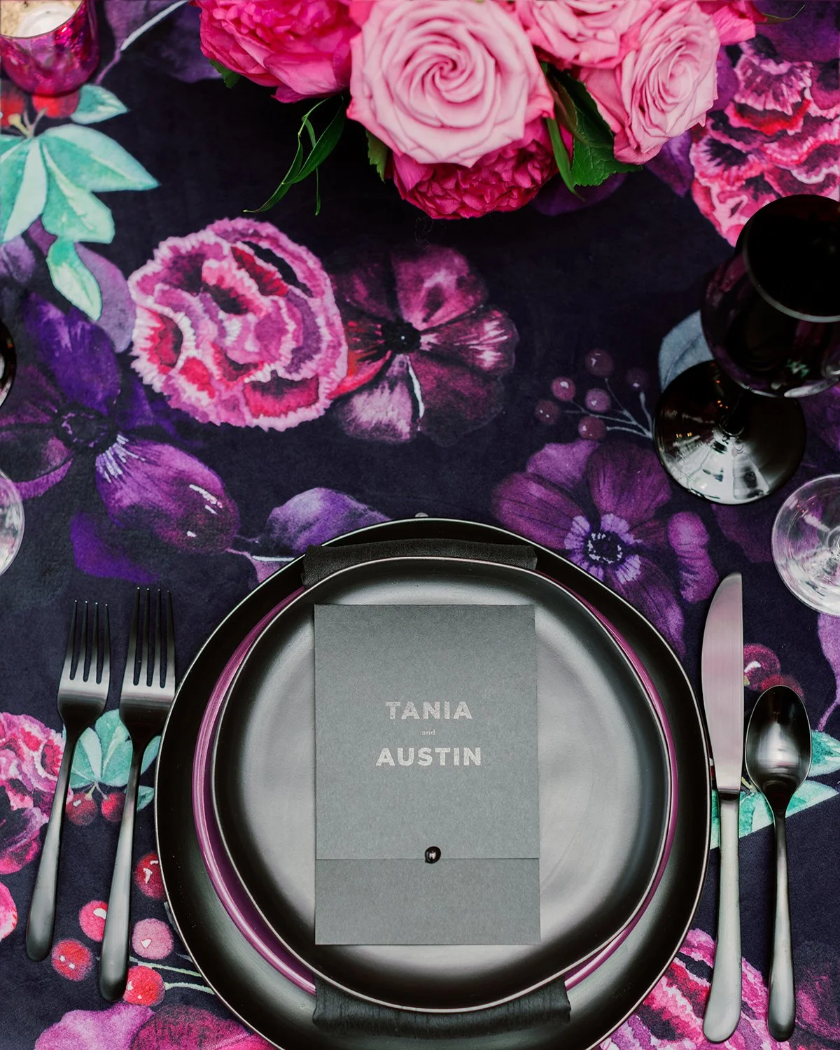 Vibrant fuchsia and purple modern wedding tablescape at Chase Park Hotel in St. Louis designed by Belli Fiori.
