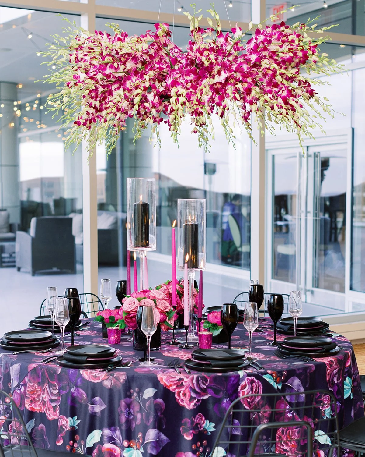 Vibrant fuchsia and purple modern wedding tablescape at Chase Park Hotel in St. Louis designed by Belli Fiori.