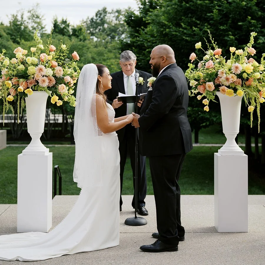 Outdoor wedding ceremony at the St. Louis Art Museum designed by Belli Fiori.