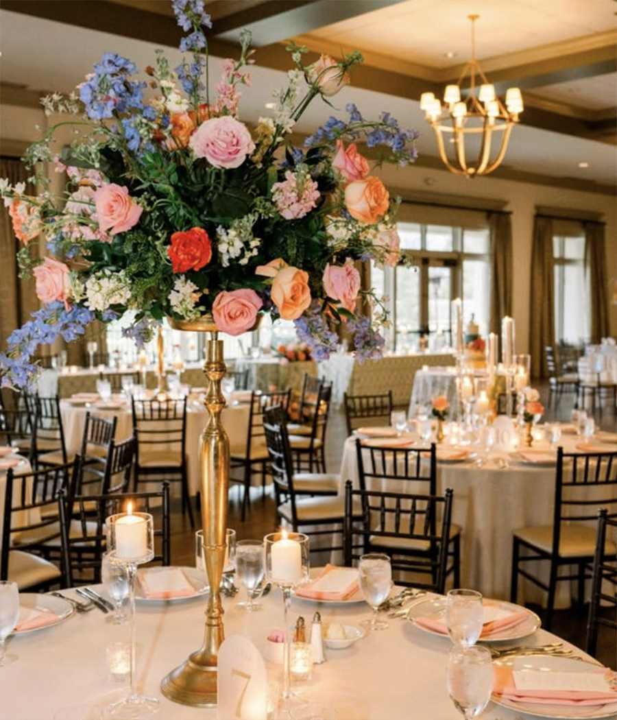 Colorful tall floral centerpiece designed by Belli Fiori in St. Louis.