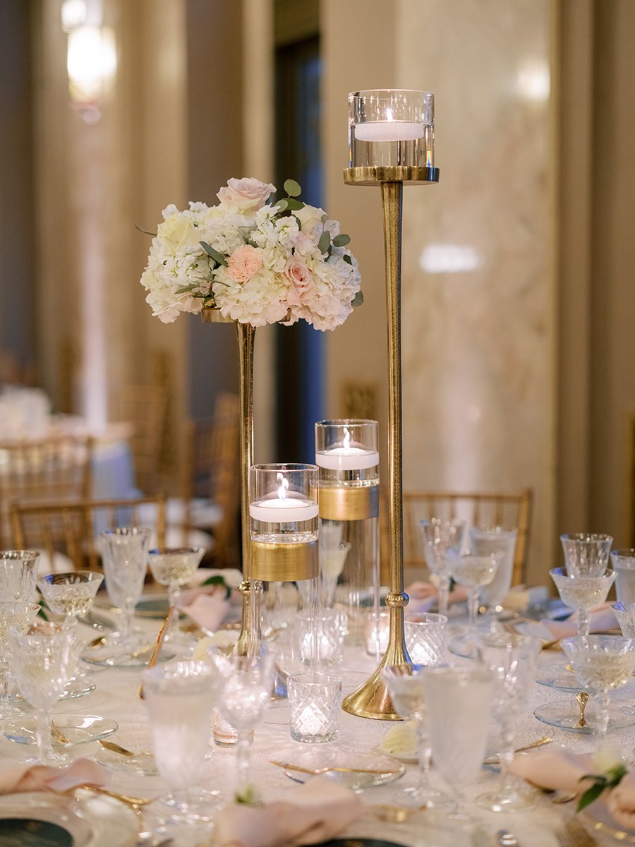 Blush and white rose centerpieces at the Stifel Theater in St. Louis.