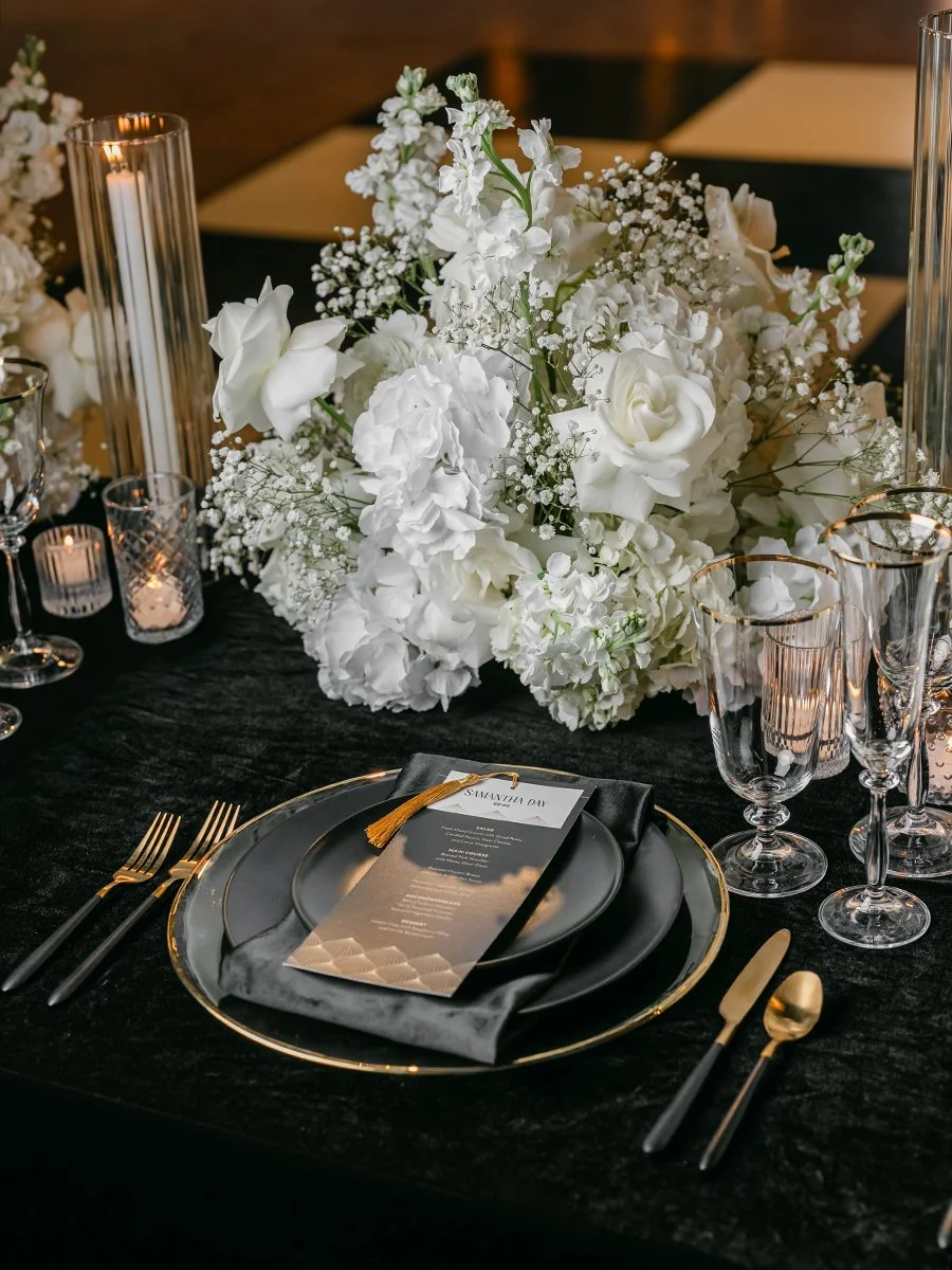All white floral centerpiece by Belli Fiori at the Gatsby Events Venue in St. Louis.