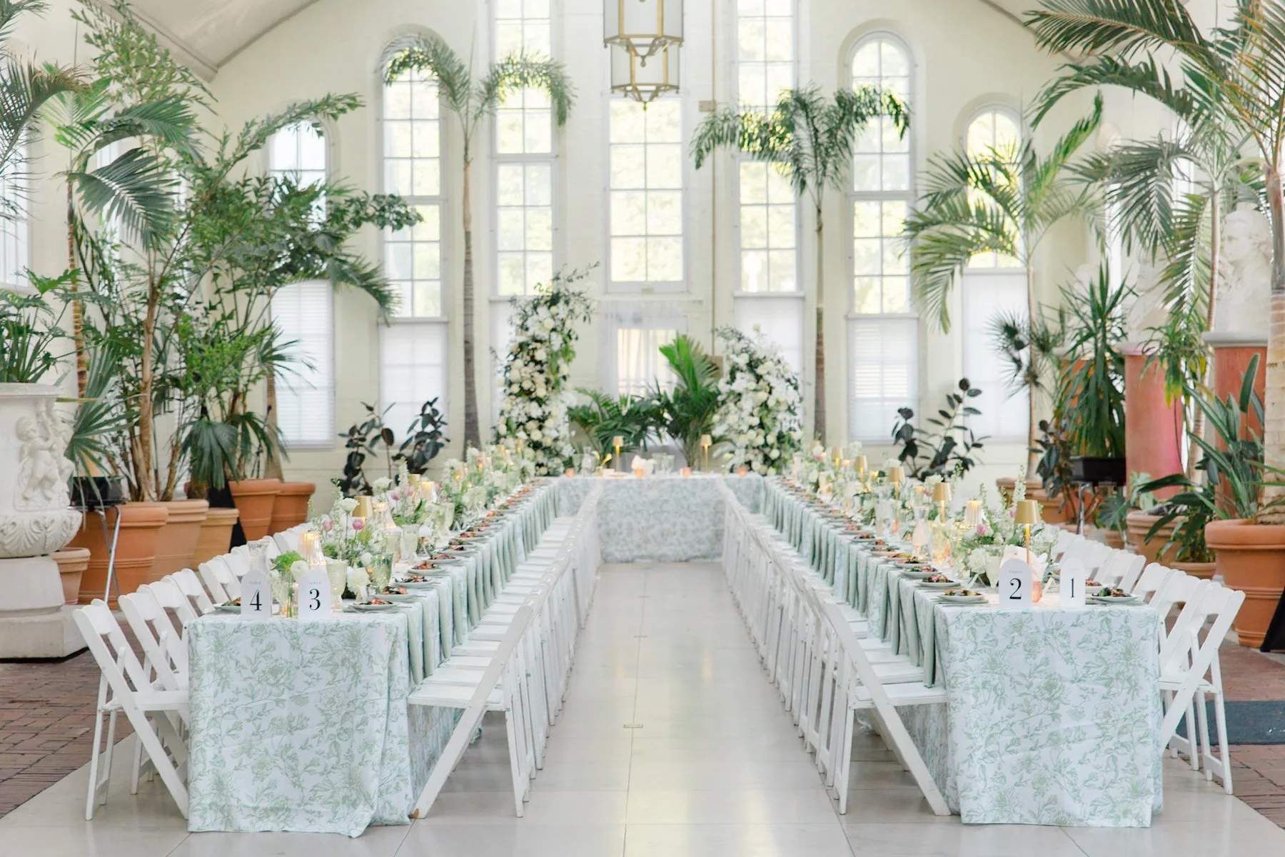 table flowers designed by Belli Fiori at the Piper Palm House at Tower Grove Park in St. Louis.