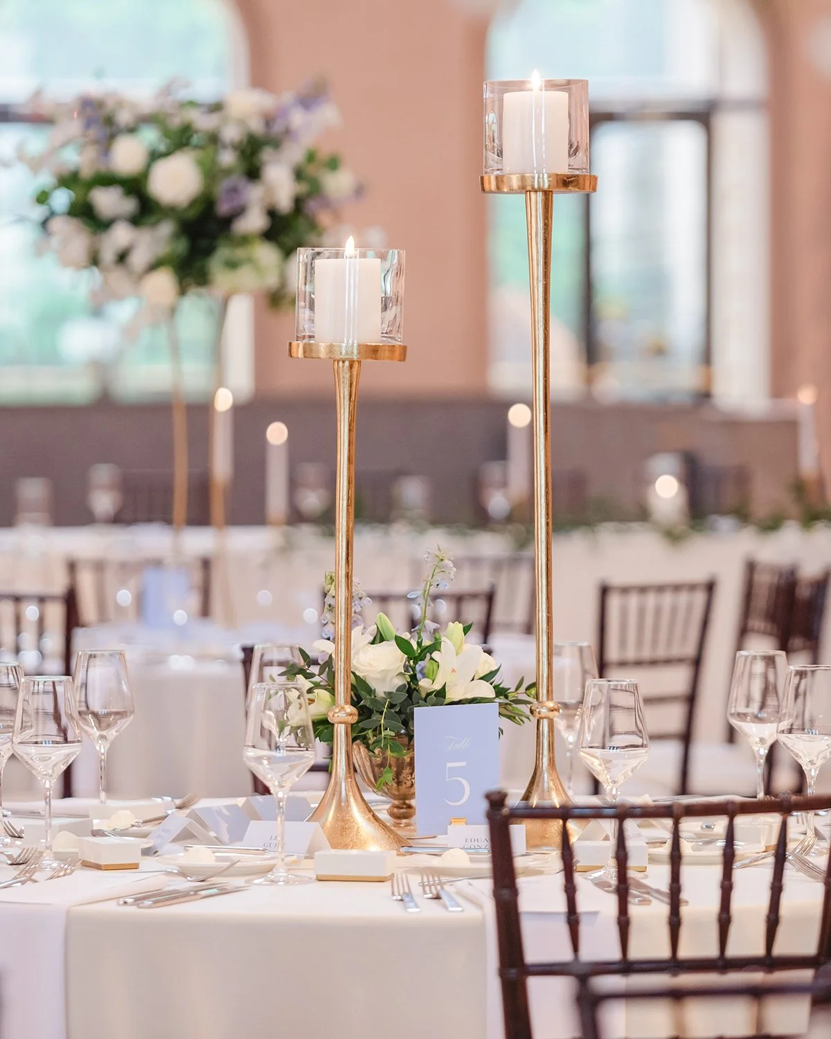 Tall Wedding centerpiece designed by Belli Fiori at the St. Louis Art Museum.