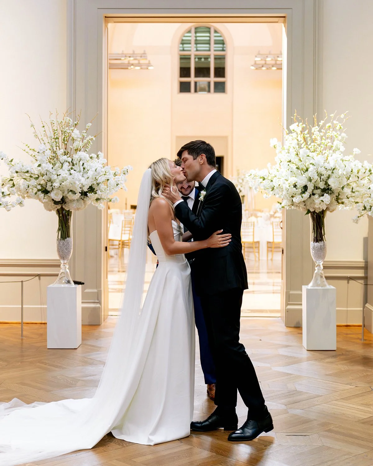 Wedding ceremony flowers at St Louis Art Museum designed by Belli Fiori.