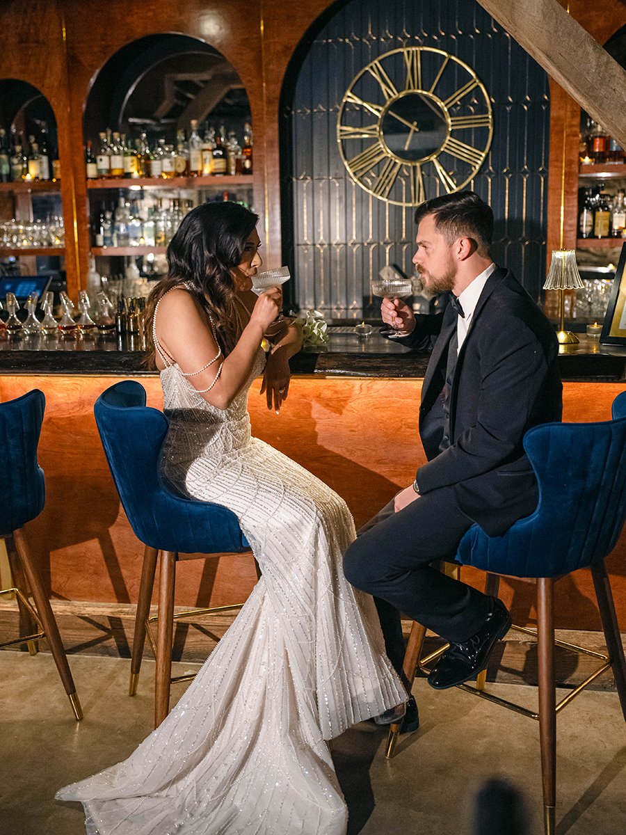 Bride and groom enjoying a reception cocktail at the Gatsby Events in St. Louis.