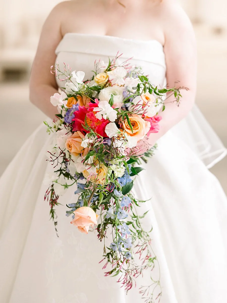 Cascading bridal bouquet designed by wedding florist Belli Fiori in St. Louis.