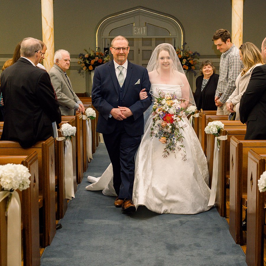 St. Louis wedding ceremony with flowers by Belli Fiori.