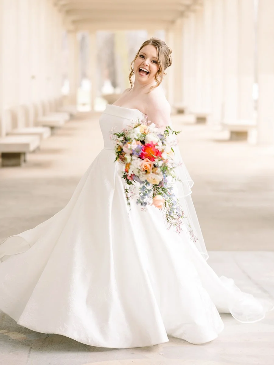 Cascading bridal bouquet designed by wedding florist Belli Fiori in St. Louis.