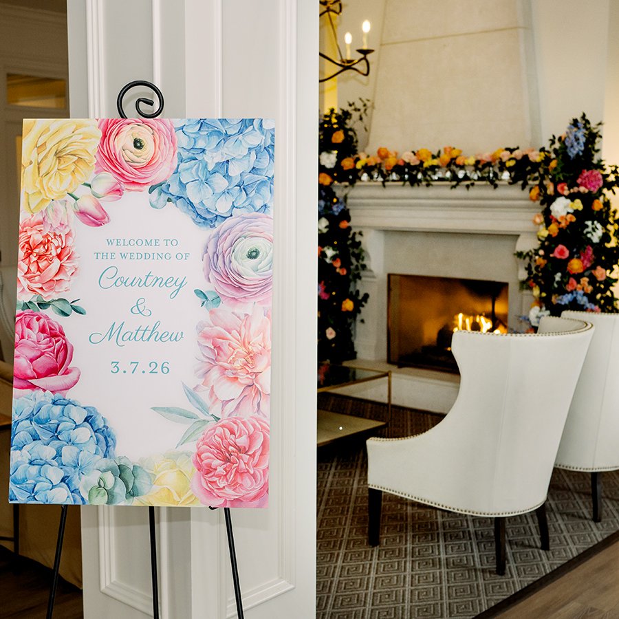 Floral mantlepiece for a wedding reception in St. Louis deigned by Belli Fiori.