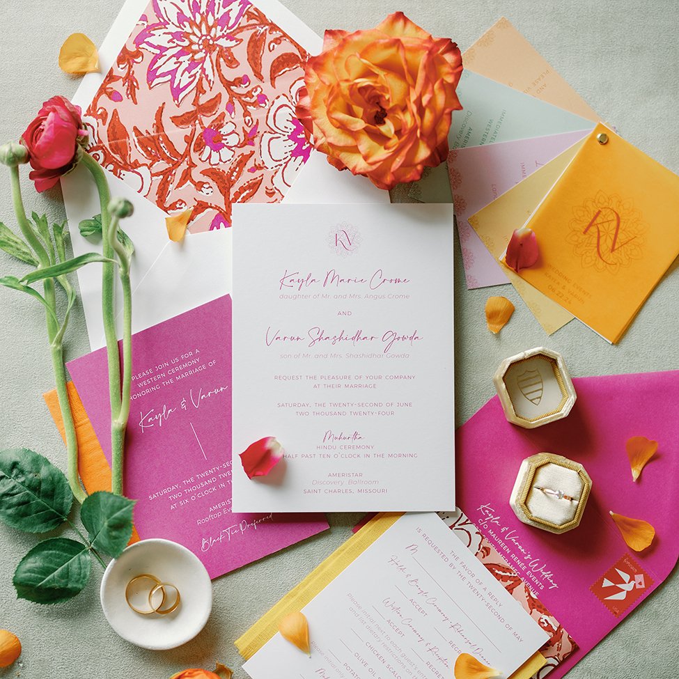 Brightly colored wedding stationery for a Hindu and Christian wedding ceremony at the Ameristar Casino and Resort in St. Louis.