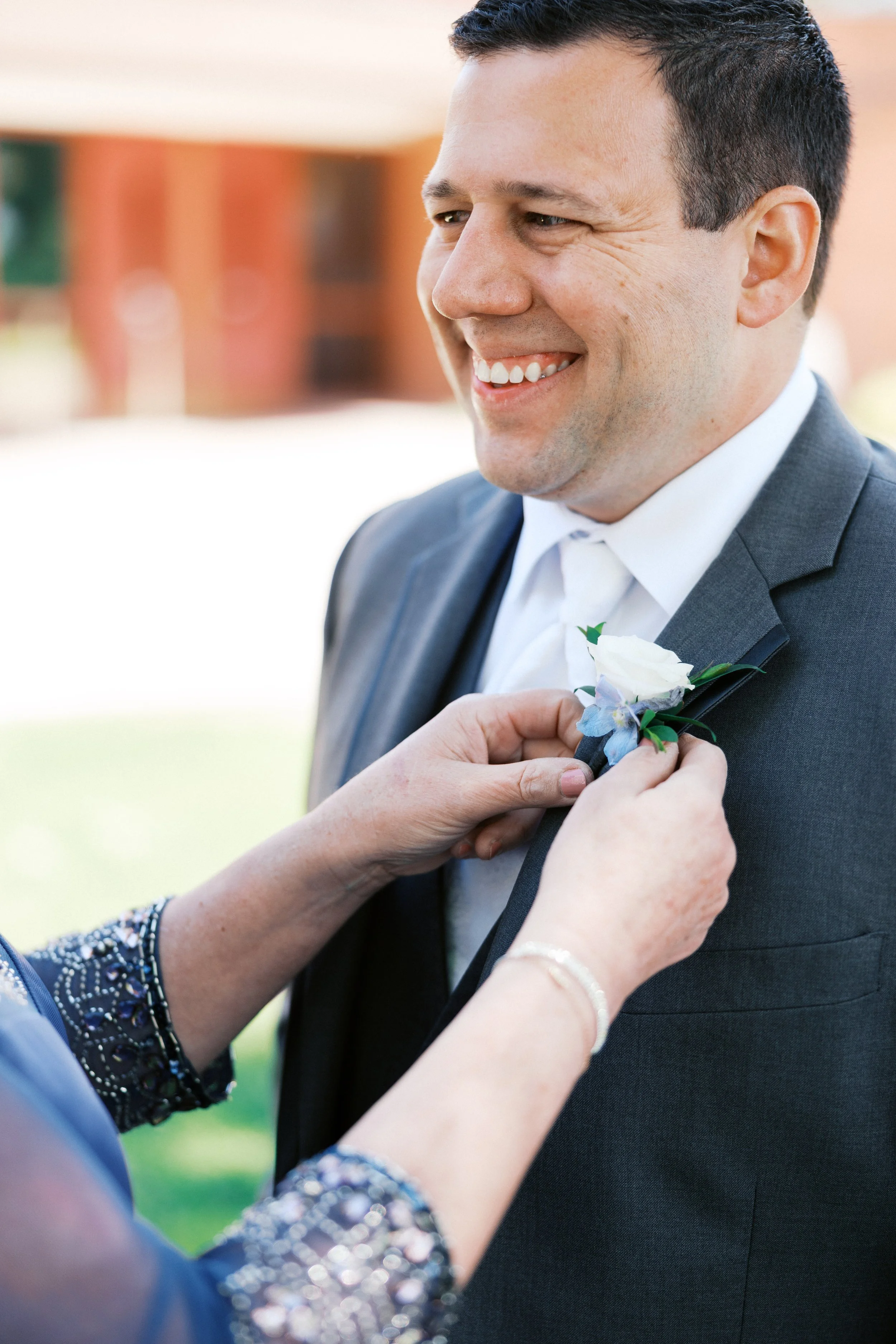 Ash Carrington Wedding Photographer St Louis -Grooms Boutinniere 