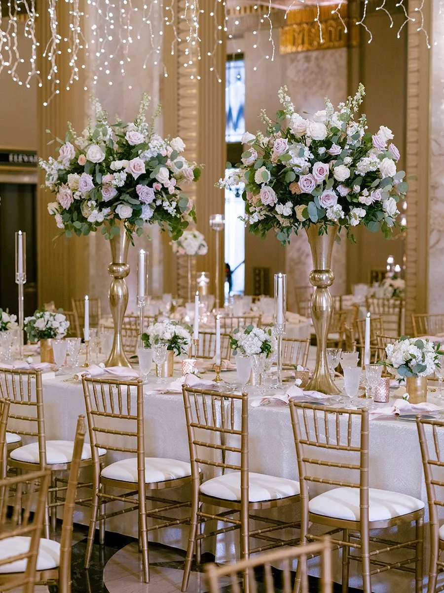 Blush and white rose centerpieces at the Stifel Theater in St. Louis.