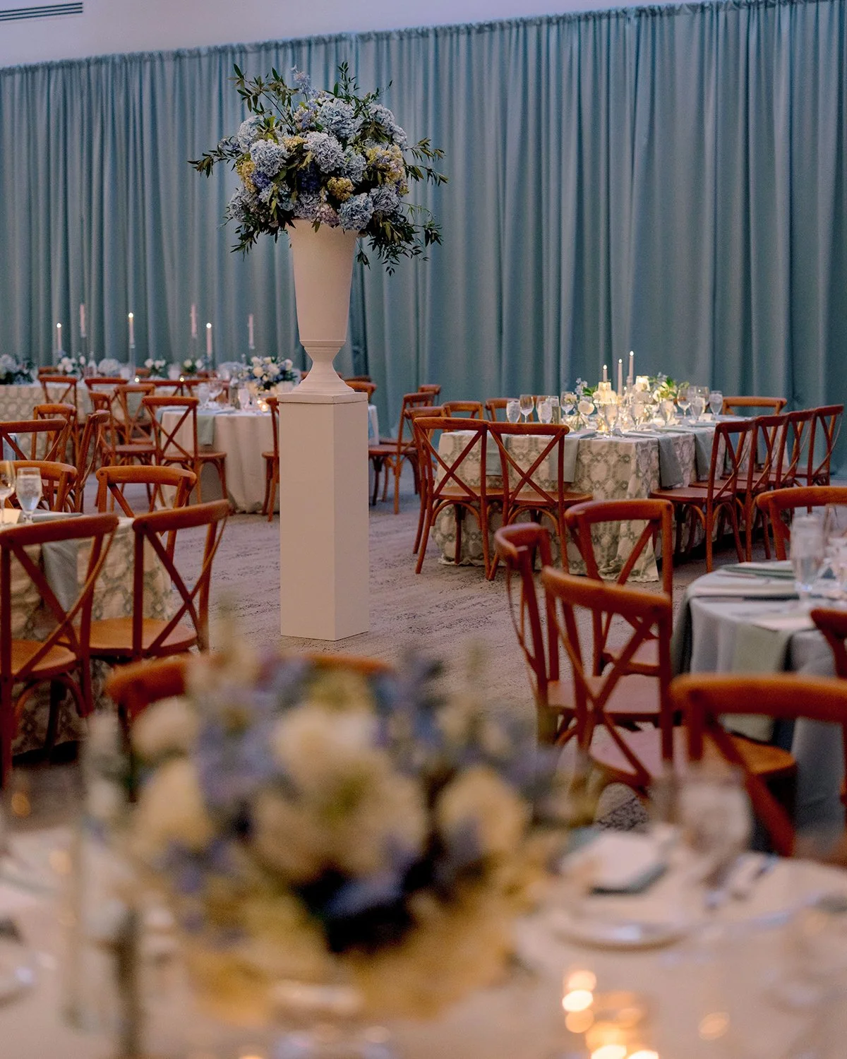 Blue and white wedding centerpieces flowers at the Missouri Botanical Garden designed by Belli Fiori.