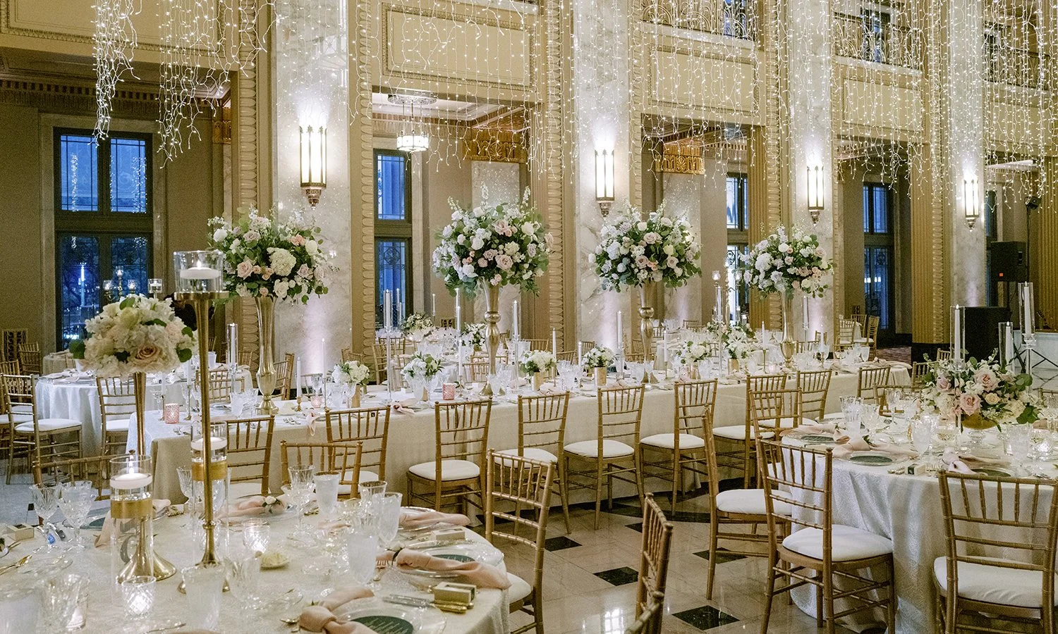Blush and white rose centerpieces at the Stifel Theater in St. Louis.
