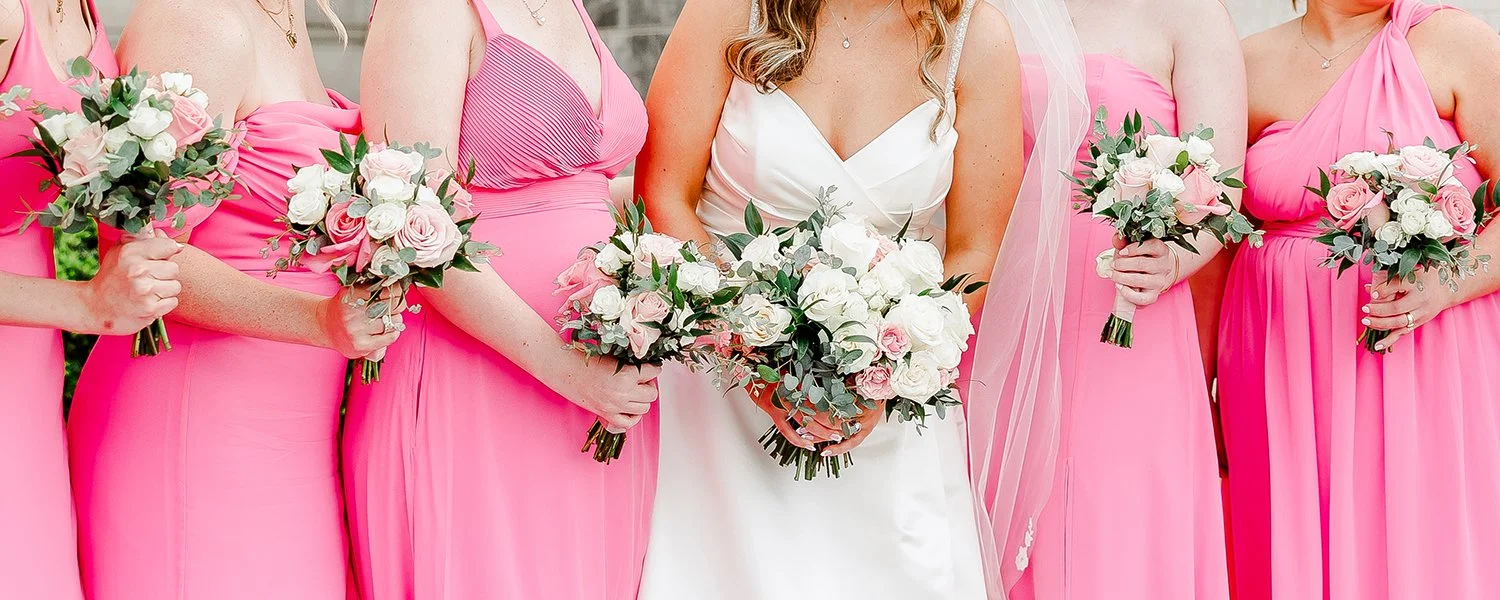 Pink and white garden style bridal bouquet and bridesmaids bouquets designed by Belli Fiori in St. Louis.