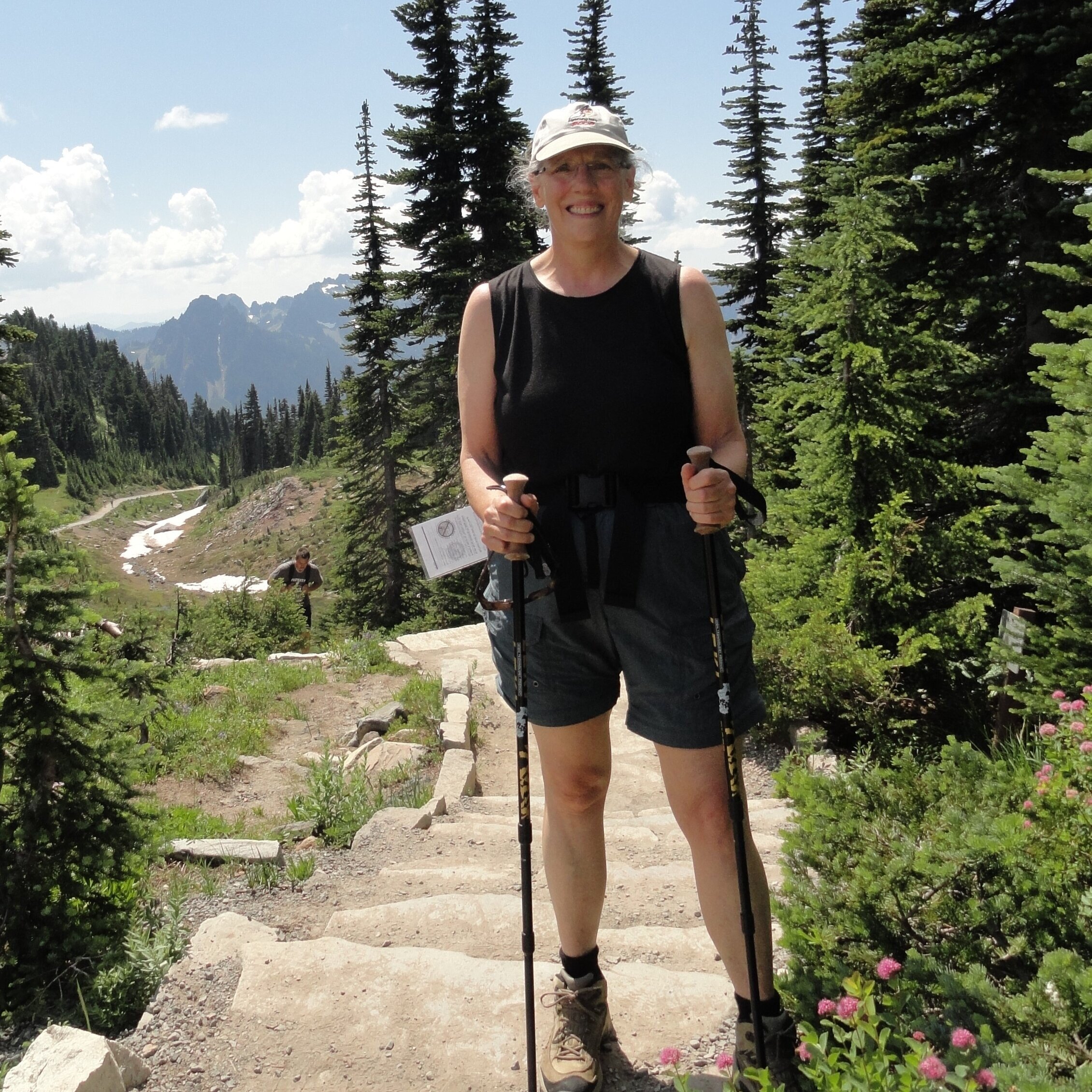 Nancy Engel hiking a mountain trail