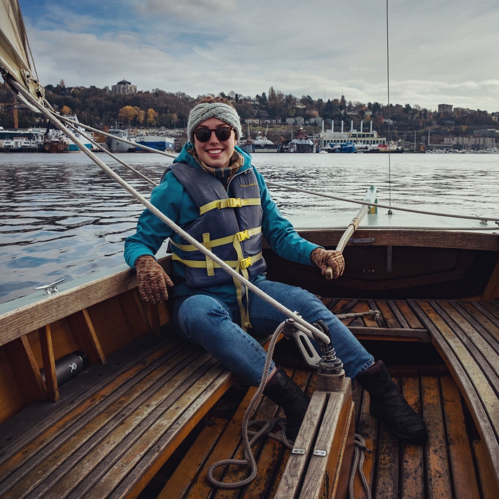 Anna Coumou sailing a small wooden boat