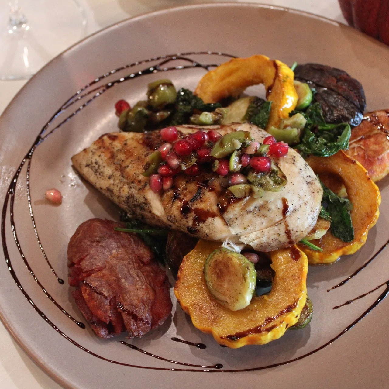 Your favorite Mary&rsquo;s Chicken is back!!! 🍂🫒 🌱 This fall inspired, gluten free dish comes with brussels sprouts + delicata squash + baby kale + smashed potatoes + hazelnuts + pomegranate-olive vinaigrette + balsamic reduction 

Call 209.253.02