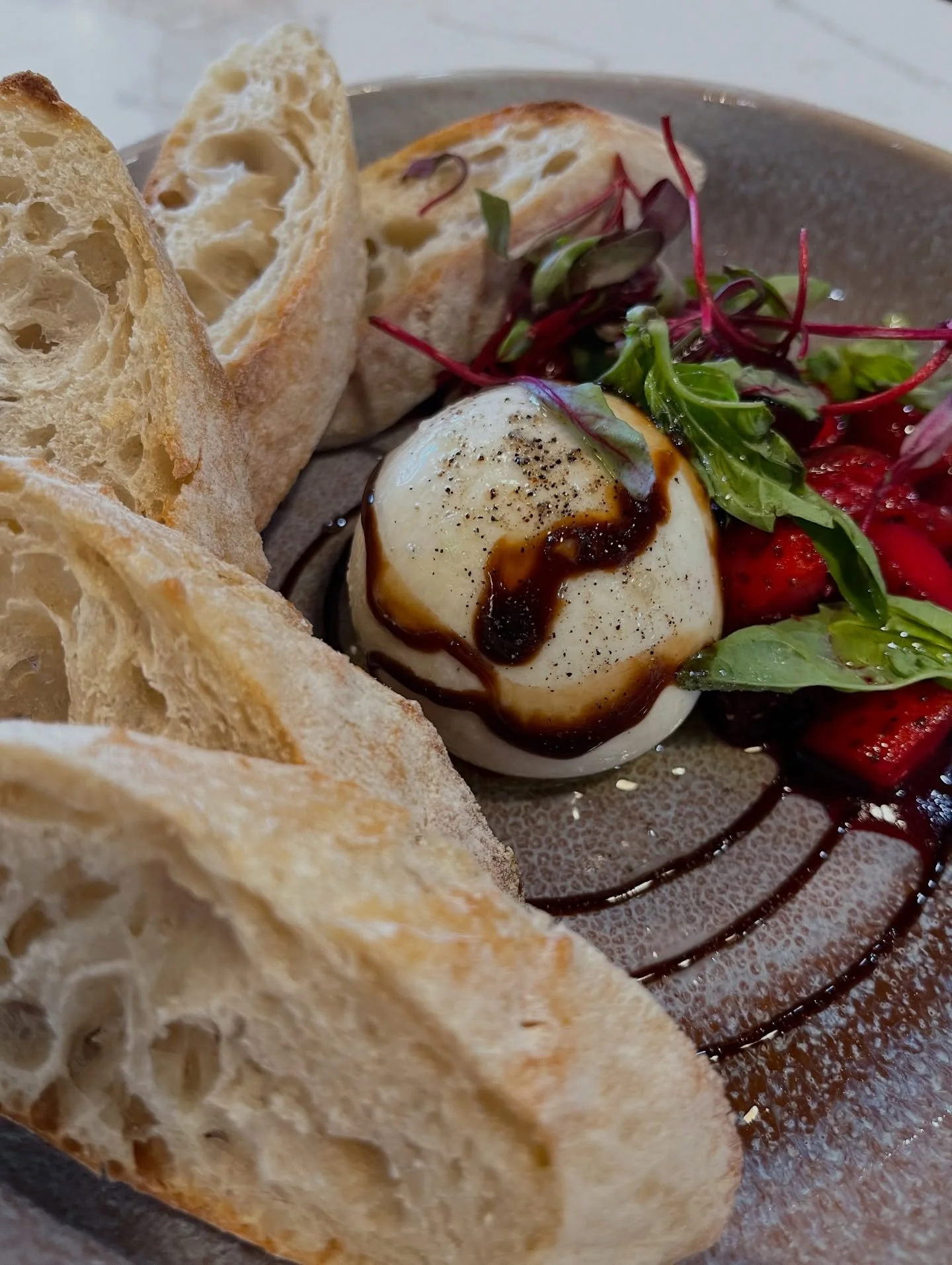 Seasonal Burrata is here 🫜🍓🧀 strawberries and beets complement this rich, creamy Italian cheese making it the perfect start before your main course 

#burrata #starter #delicious #food #local