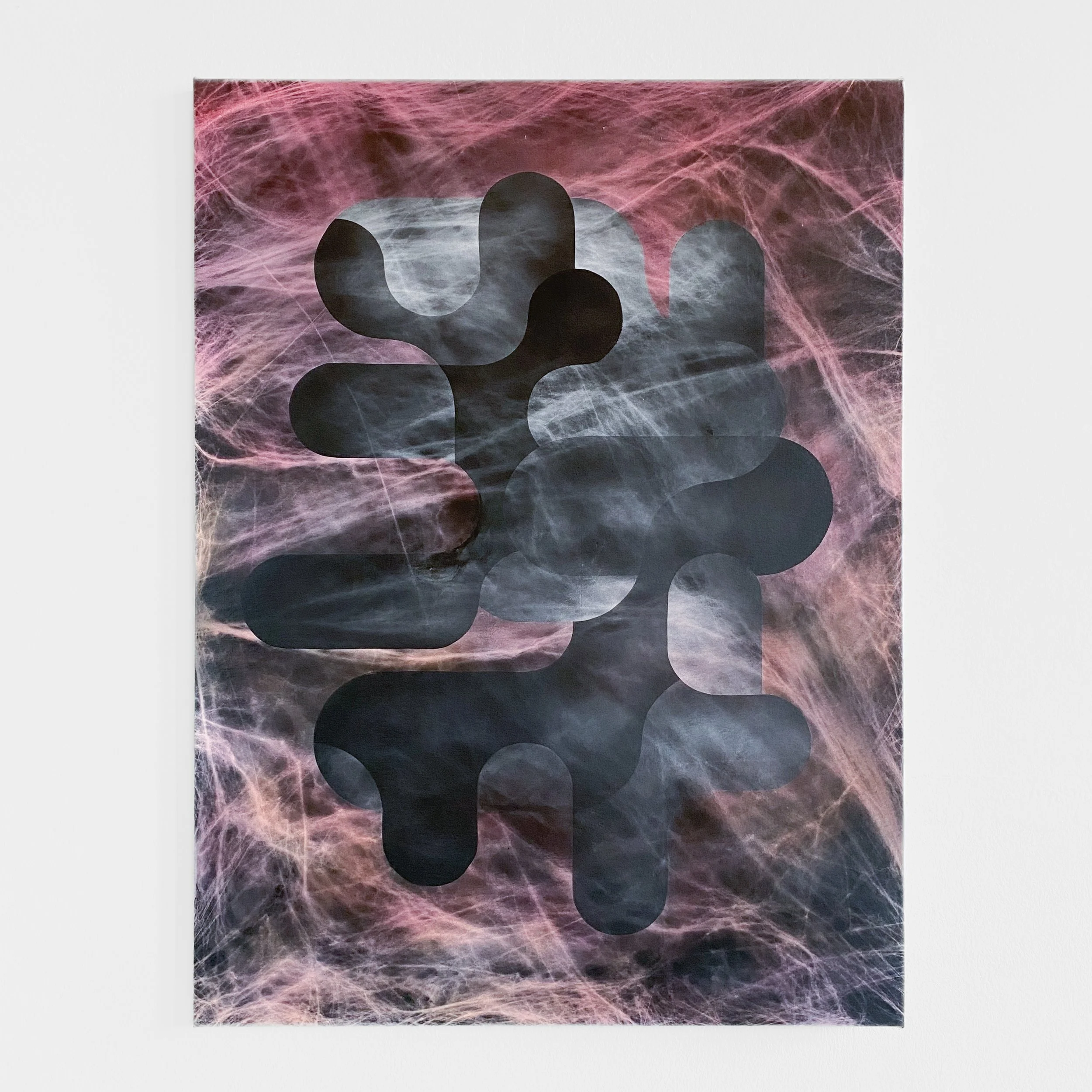 Abstract artwork featuring a dark hand silhouette overlayed on a background of swirling pink and blue light streaks.