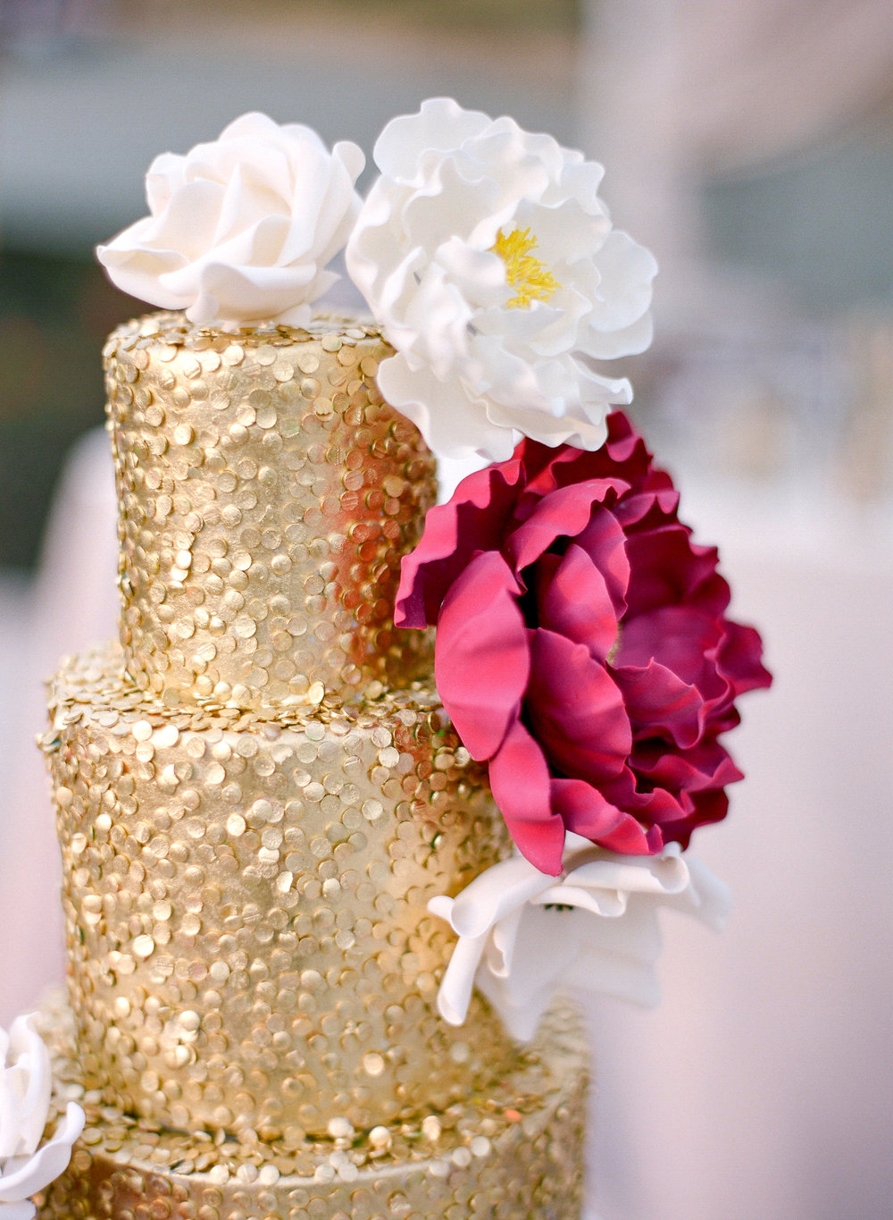 Amador_County_Wedding_Cake_Gold_Red_White_Flowers_Sparkles_Rancho_Victoria_Vineyard_Northern_California.jpg