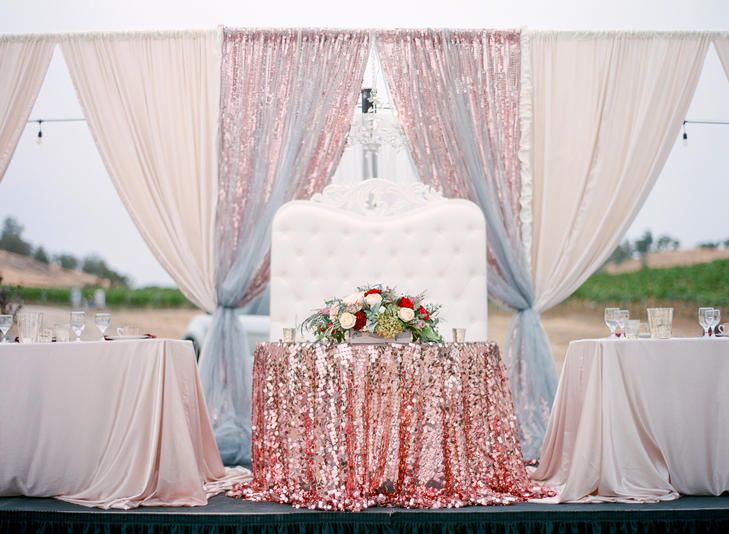 sweetheart_table_draping_gold_silver_cream_flowers_rancho_victoria_vinyards.jpg