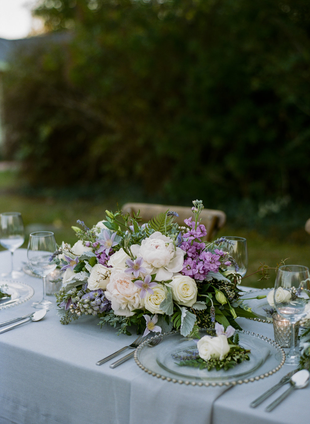 Violette-fleurs-roseville-sacramento-california-Flower-farm-inn-wedding-florist-spring-tablescape-purples-blushes-grays-upscale-design.jpg