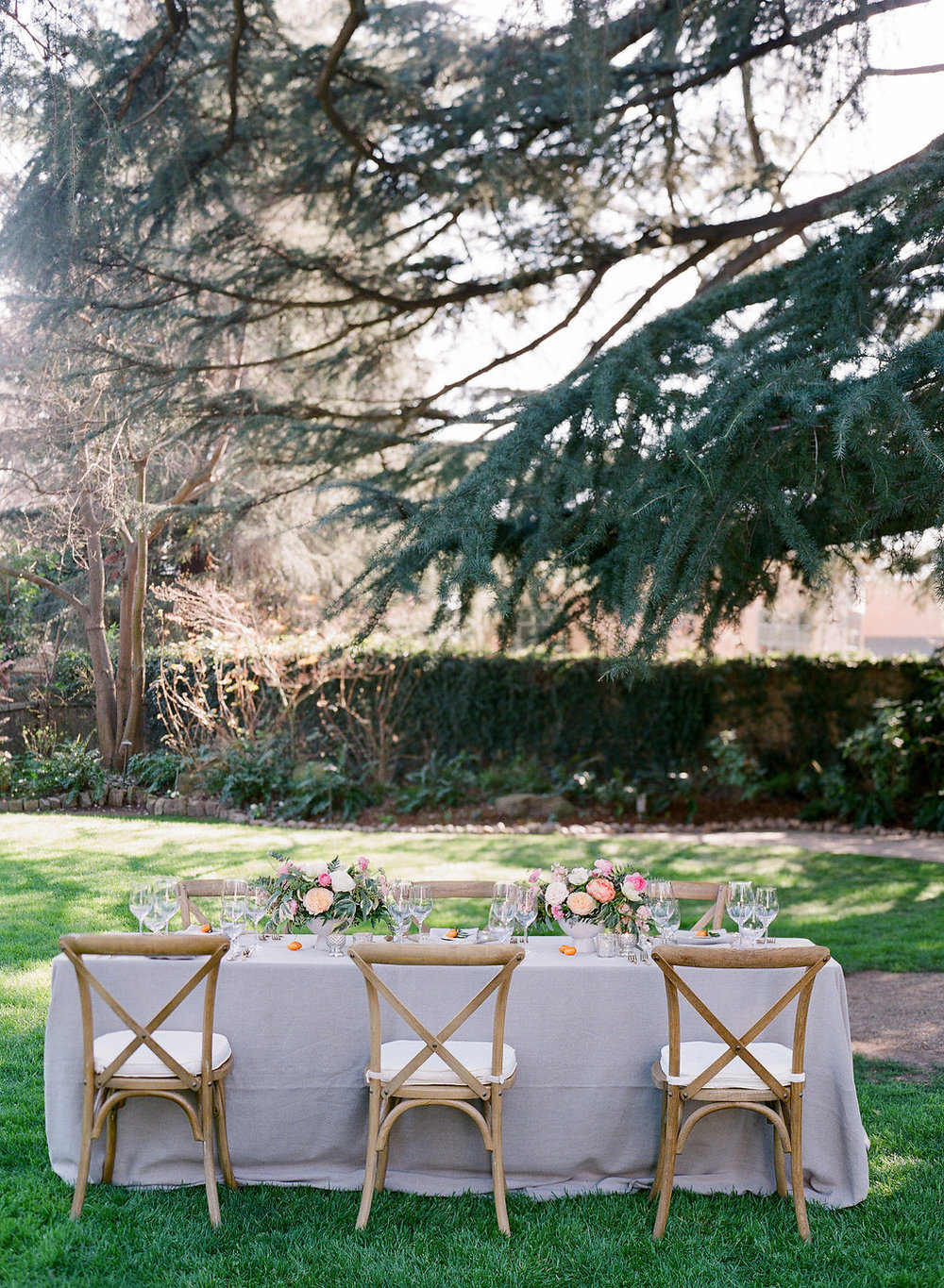table_setting_romantic_centerpieces_outdoor_wedding_Wine_and_Roses_Lodi.jpg