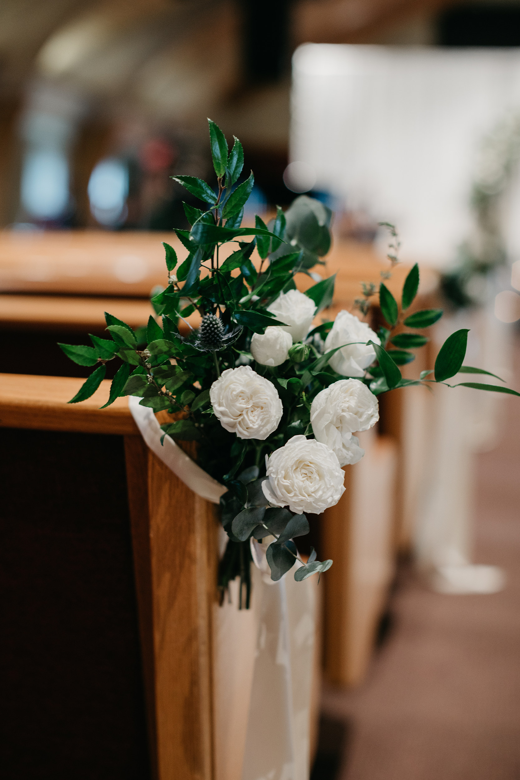 Violette-fleurs-event-design-roseville-Nelli-noel-photography-the-falls-event-center-Flowers-Upscale-Decor-Groom-Bride-pew-details.jpg