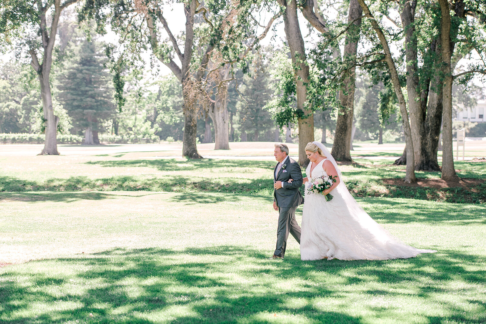 Violette-fleurs-roseville-napa-california-luxury-florist-silverado-resort-and-spa- weddings-by-scott-and-dana-bride-justin-alexander-gown-feathers.jpg