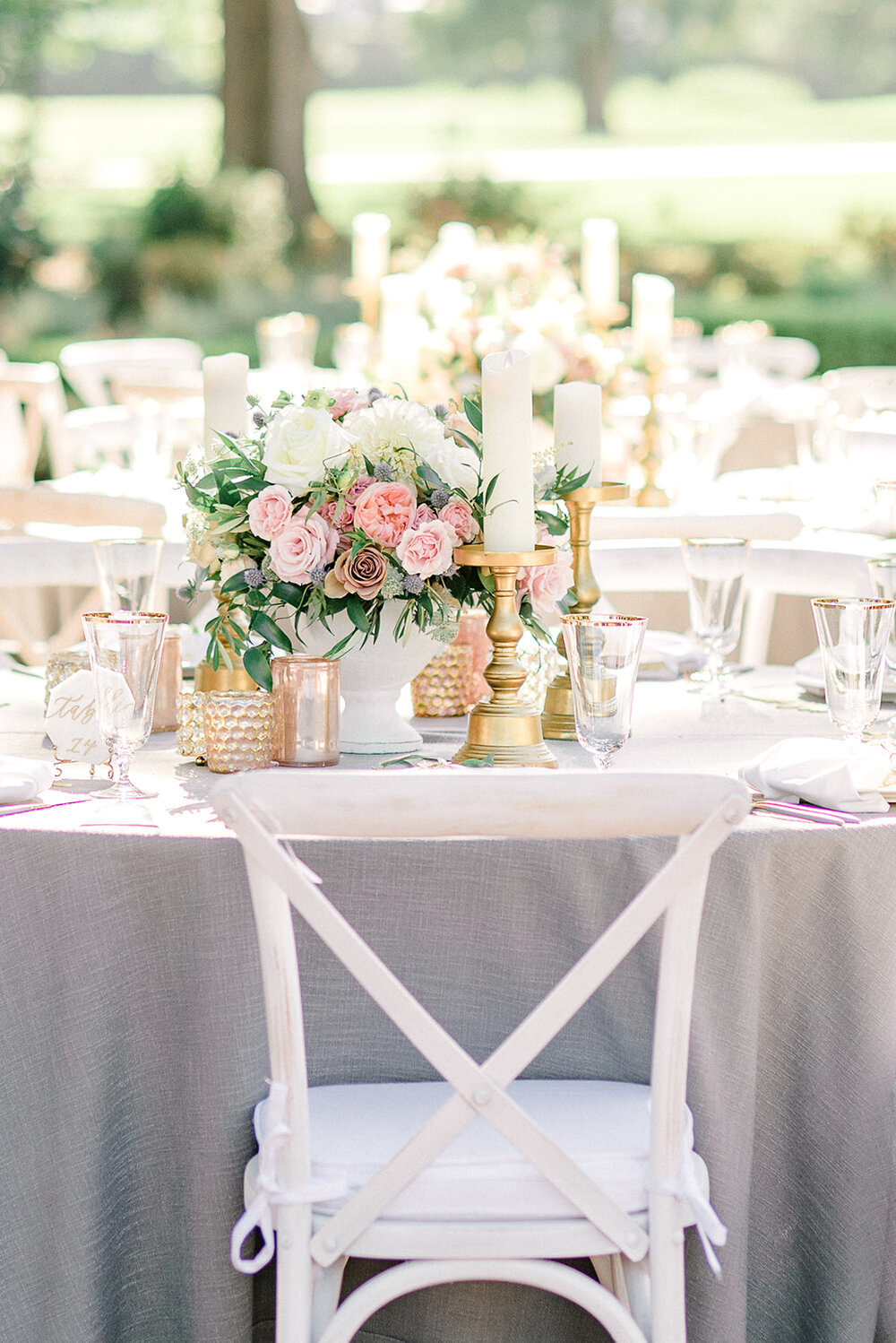 Violette-fleurs-roseville-napa-california-luxury-florist-silverado-resort-and-spa- weddings-by-scott-and-dana-reception-centerpiece-gold-candleholders-blush-mauve-flowers.jpg