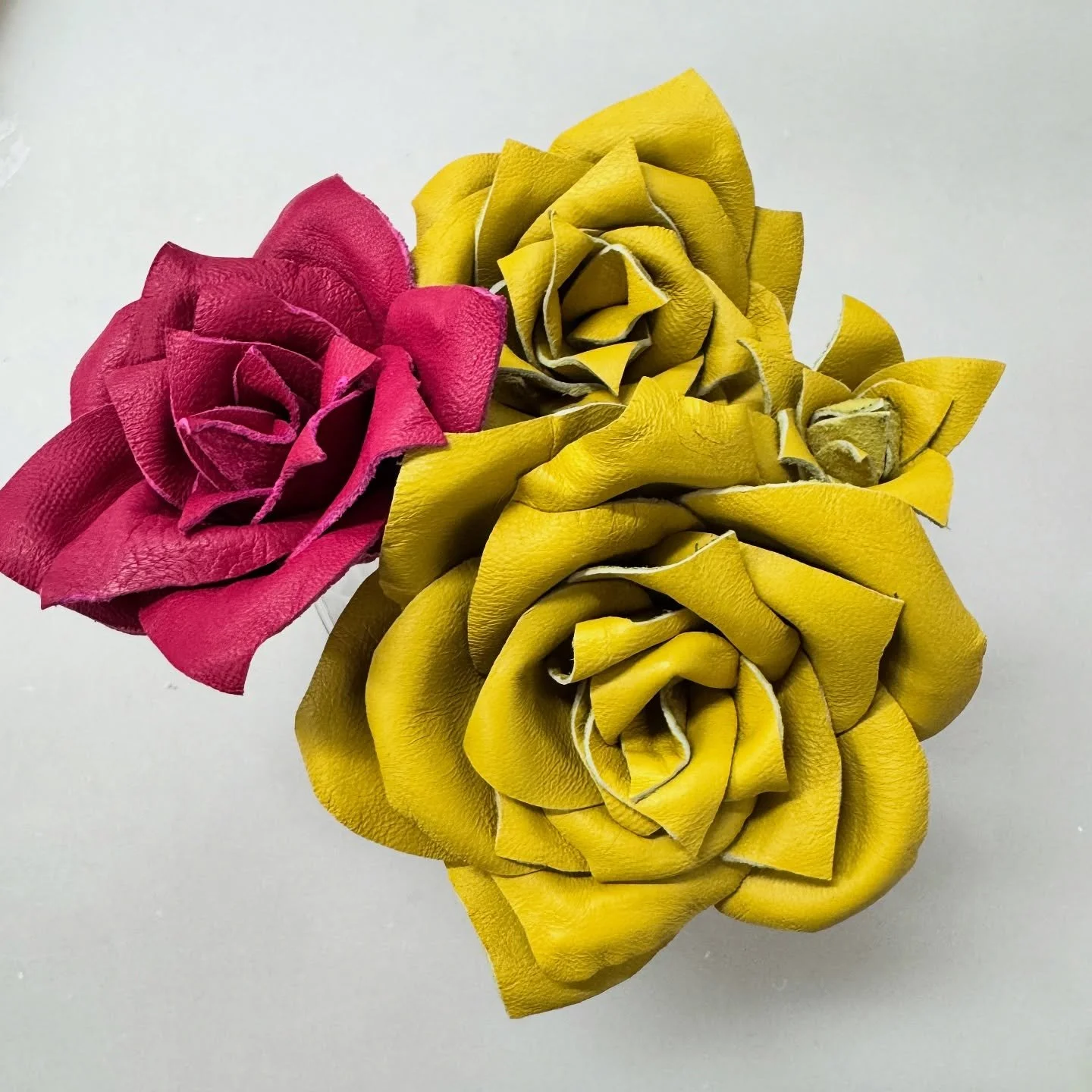 Handmade leather roses.
.
.
#karenmorrismillinery #kmhats #handmadewithlove #leathercraft #leatherroses #millinerycouture #nappaleather #hatmakingworkshop