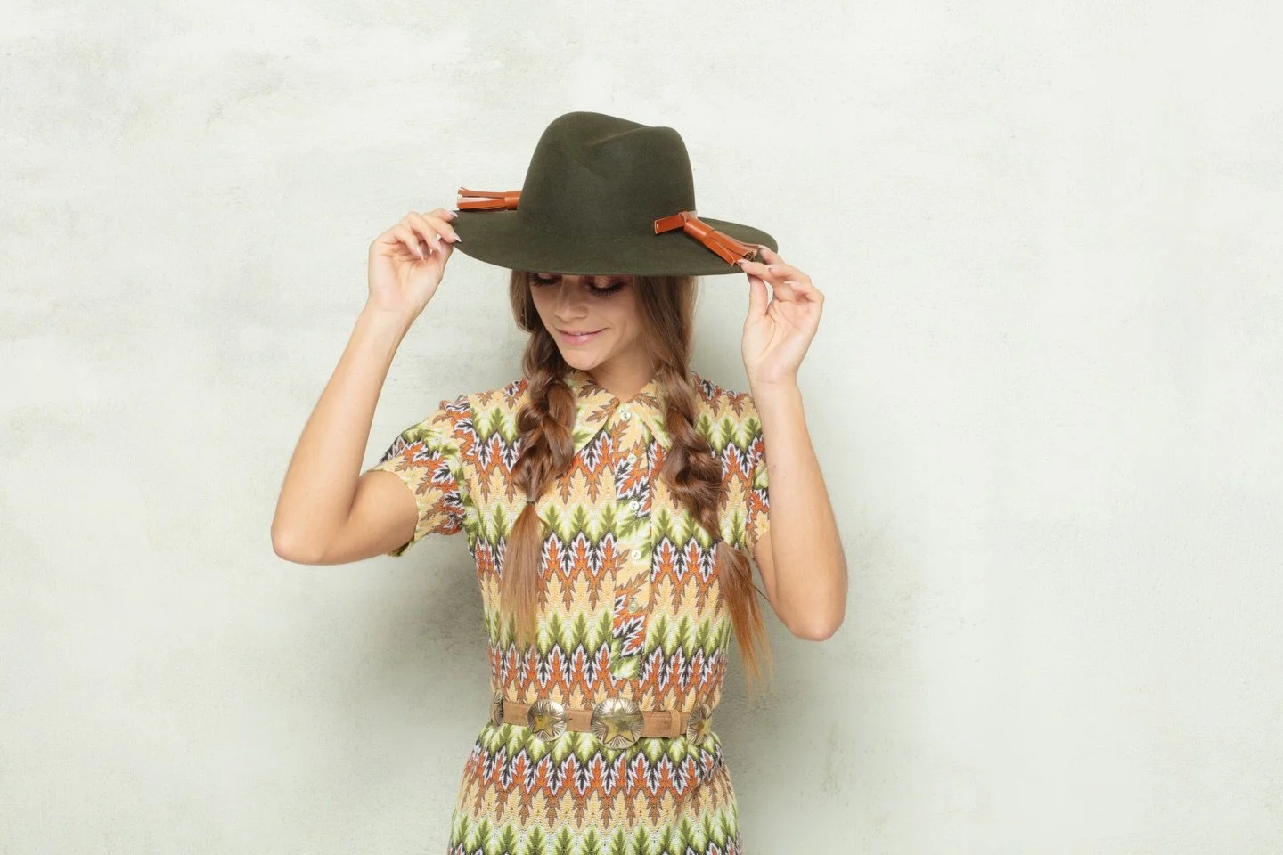 Stepping out once more in our Signature Fedora Hat Brittany. This time in rich Loden Green velour felt, finished with handcrafted calf-leather tassel trims. A classic worth repeating 🤎

#wearableart #customdesigns #millinery #customhats