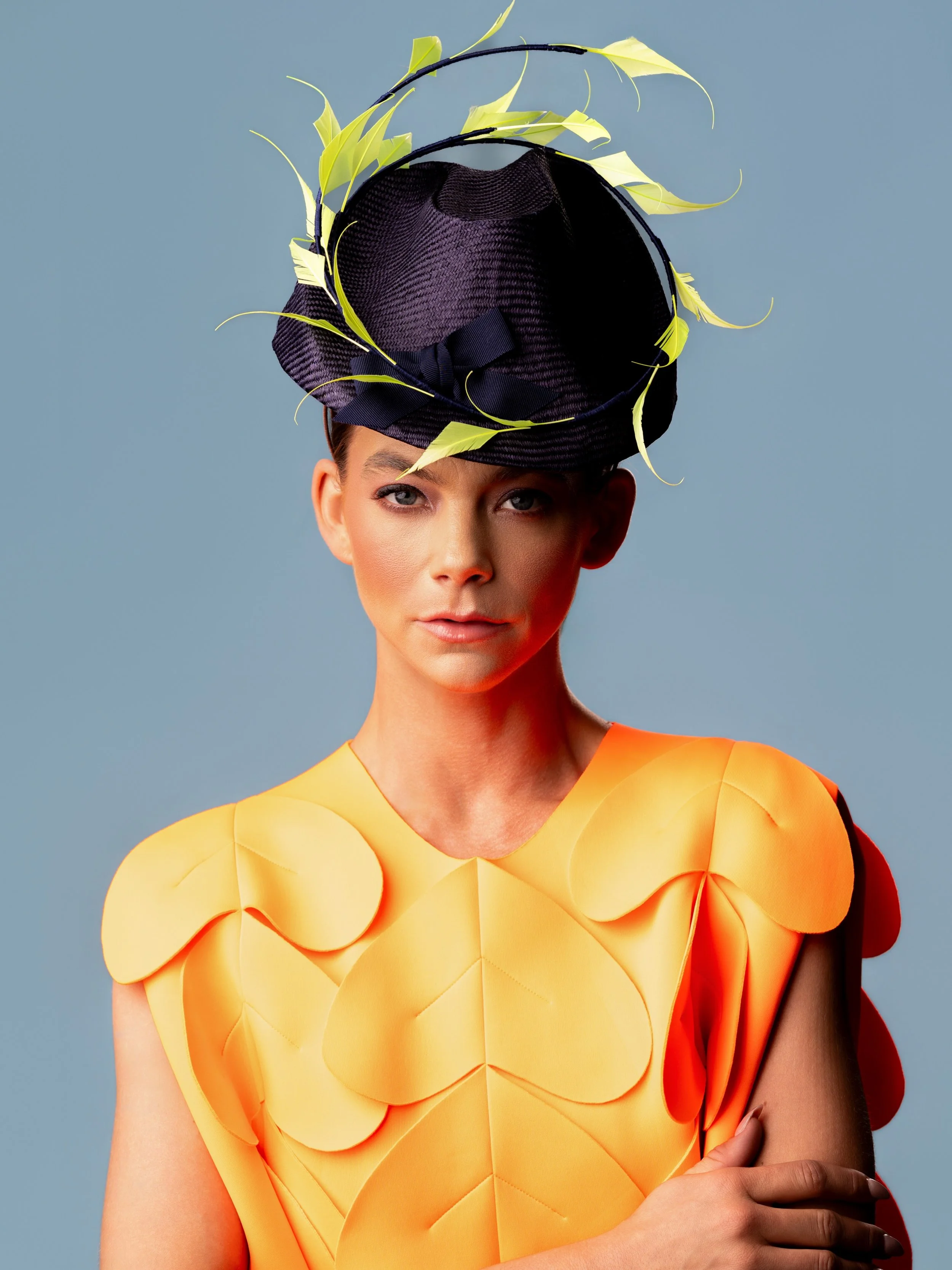 A sculptural statement with a vibrant twist. 

Handcrafted from parasisal straw and finished with dramatic like feather curls, this headpiece is designed to bring modern elegance and bold movement to any occasion.

Handmade with intention. 

#wearabl
