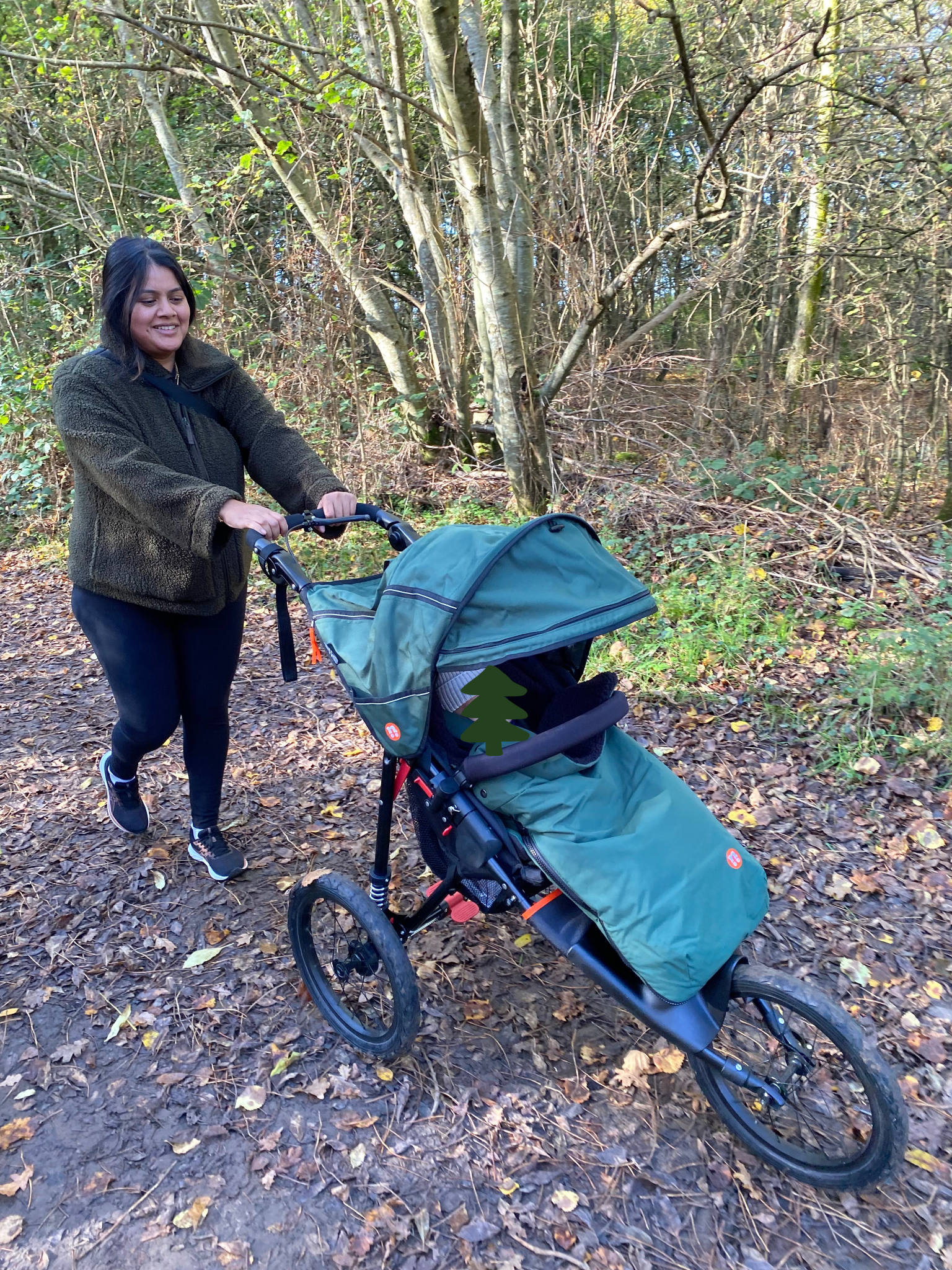 Out'n'About pushchair - baby face covered.png