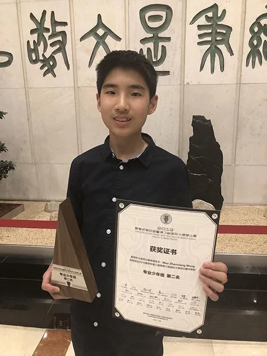 Max Wung with Ai Qin trophy