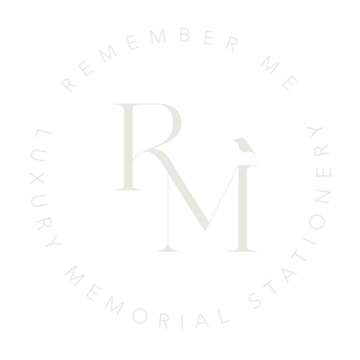 Black logo with a circle of white text reading "Remember Me, Your Memorial Stationery" around three stylized initials R, M, M in the center.